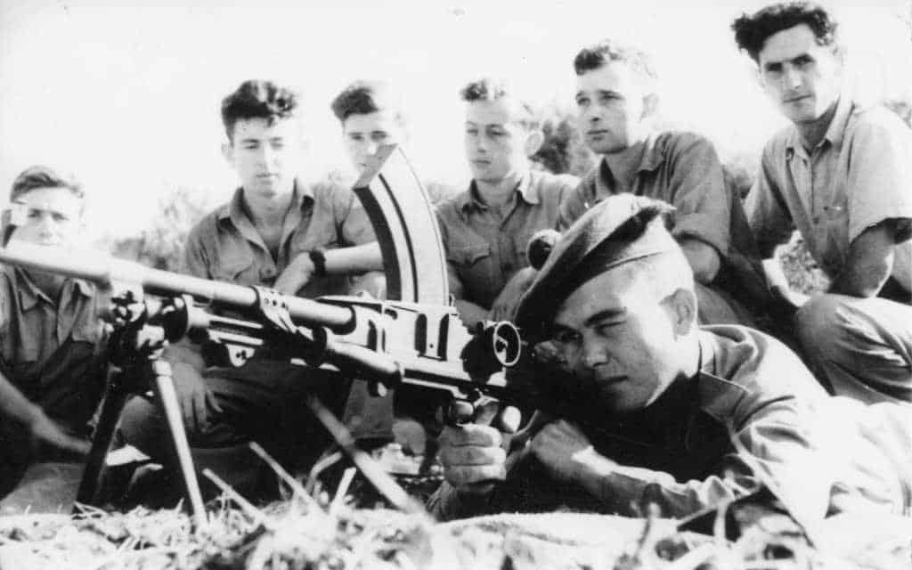 Palmach soldiers training on machine gun